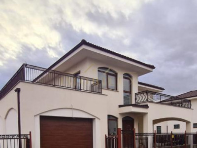 Casă individuală cu 4 camere + Garaj , zonă liniștită 
