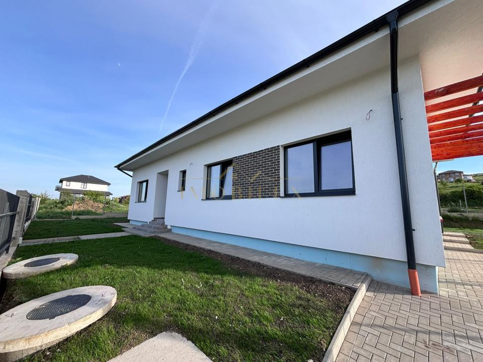 Casa pe un nivel ,teren 500 mp ,Chinteni